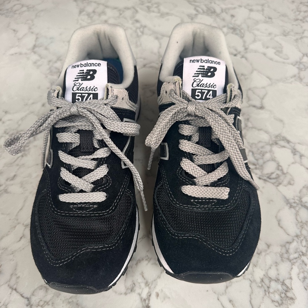 New Balance 574 Sneakers in Black and Gray